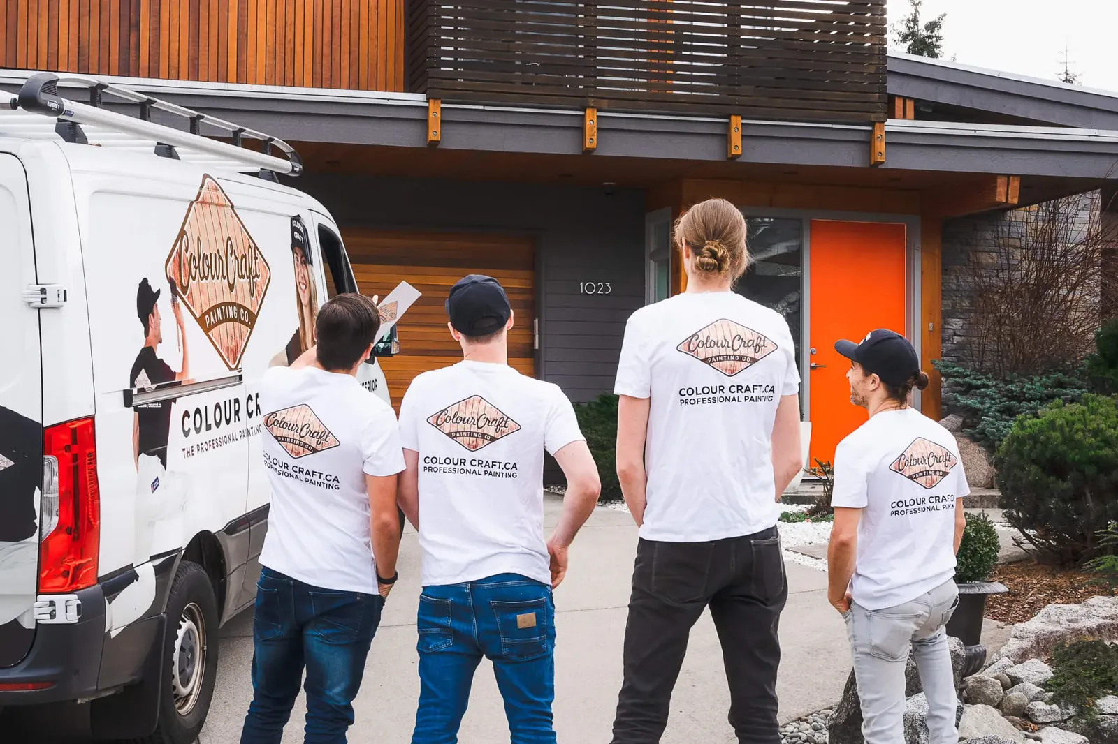 Colour Craft Painting crew arriving at a residential home with a branded company van