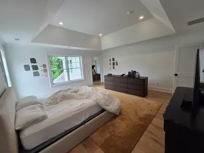 Before main bedroom with contractor-white walls in this Bala Cynwyd home