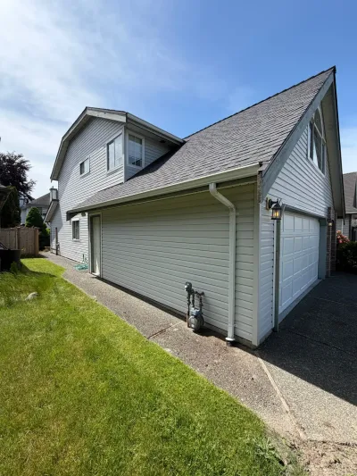 Before exterior trim colour-match project at this Ladner home in Delta, BC