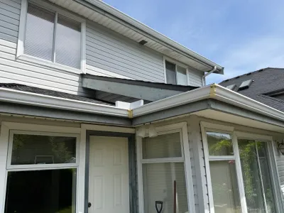 Before front entry and fascia detail at this Ladner home in Delta, BC