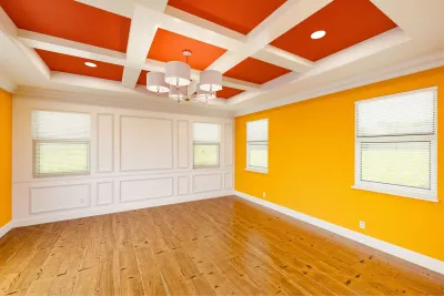 Cozy finished basement living room with light neutral walls, ceiling painting in Whistler BC by Colour Craft Painting