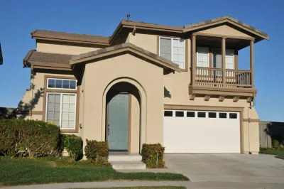 Professional exterior painters at work on North Vancouver BC home, Colour Craft Painting