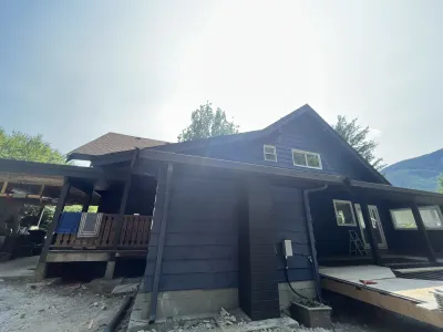 After: siding detail, fresh Duration Flat, Brackendale