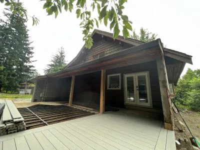Before: deck area, weathered wood, Brackendale