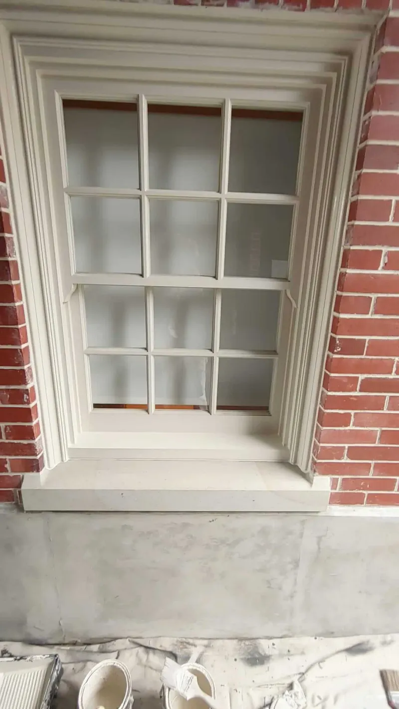 After: Freshly painted window with surround and stone sill, Central - Granville St, Vancouver, BC