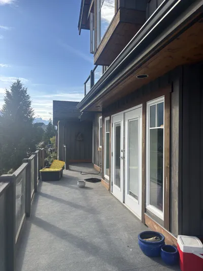 Before: Dennis residence front view, original colour, Garibaldi Highlands