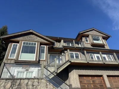 Before: Dennis residence front, original colour, Garibaldi Highlands Squamish
