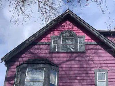 After: Front view with cherry blossoms, East Vancouver