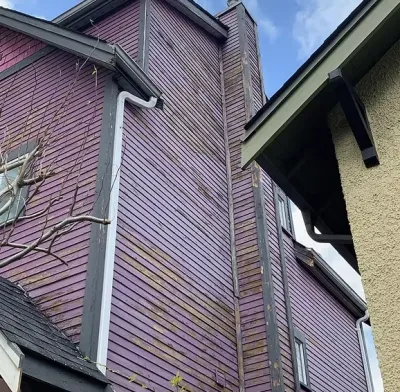 Before: Side wall showing weathered siding condition, East Vancouver