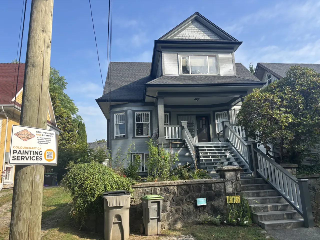 Completed heritage exterior painting in East Vancouver BC, grey siding, white trim by Colour Craft Painting
