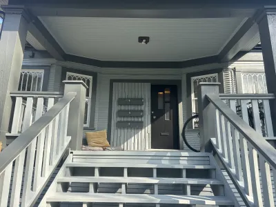 After: East Vancouver heritage home porch detail, fresh paint