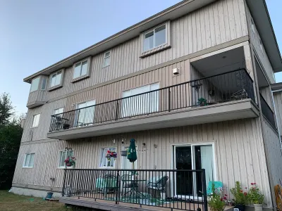 Before: back view with balconies, original colour