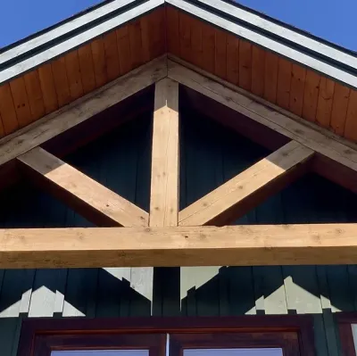 Before: Bare sanded timber beams showing raw wood grain, Garibaldi Highlands Garibaldi Highlands