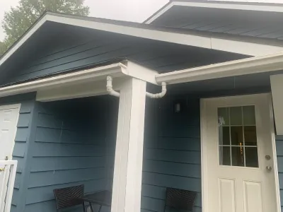 After: porch detail, white trim and blue siding, Garibaldi Highlands Squamish