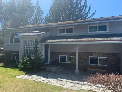 Before: front view, Garibaldi Highlands Squamish, original grey siding