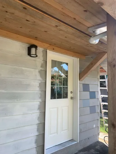 Before: door detail, Garibaldi Highlands Squamish, colour samples on siding