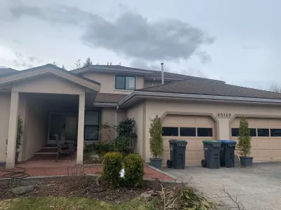 Before: front view, beige stucco