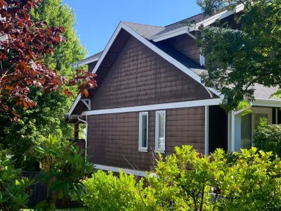 Before: side view, Garibaldi Highlands Squamish BC, original siding condition