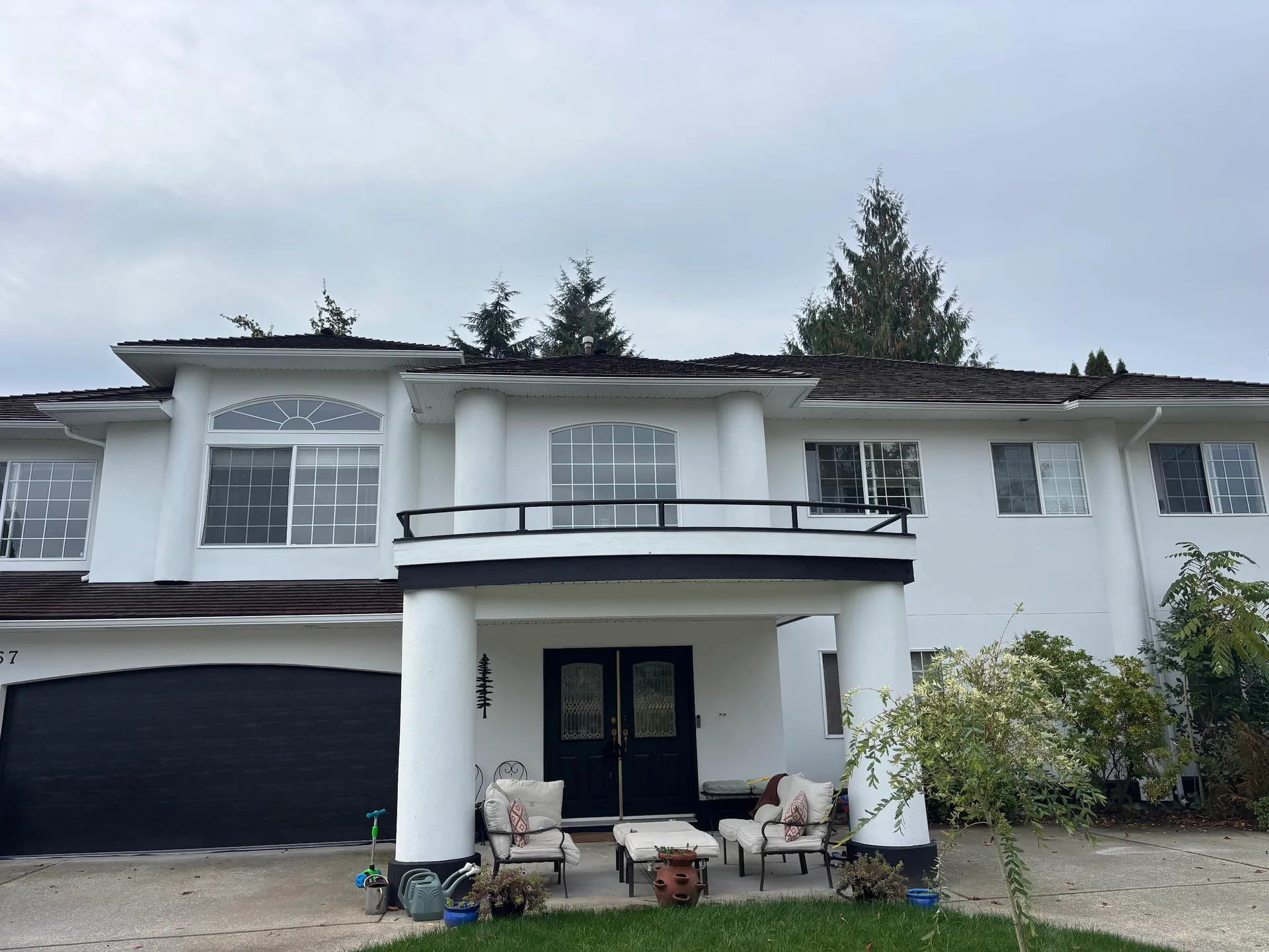 White Stucco & Black Trim Exterior Repaint, Garibaldi Highlands, Squamish, BC, completed by Colour Craft Painting