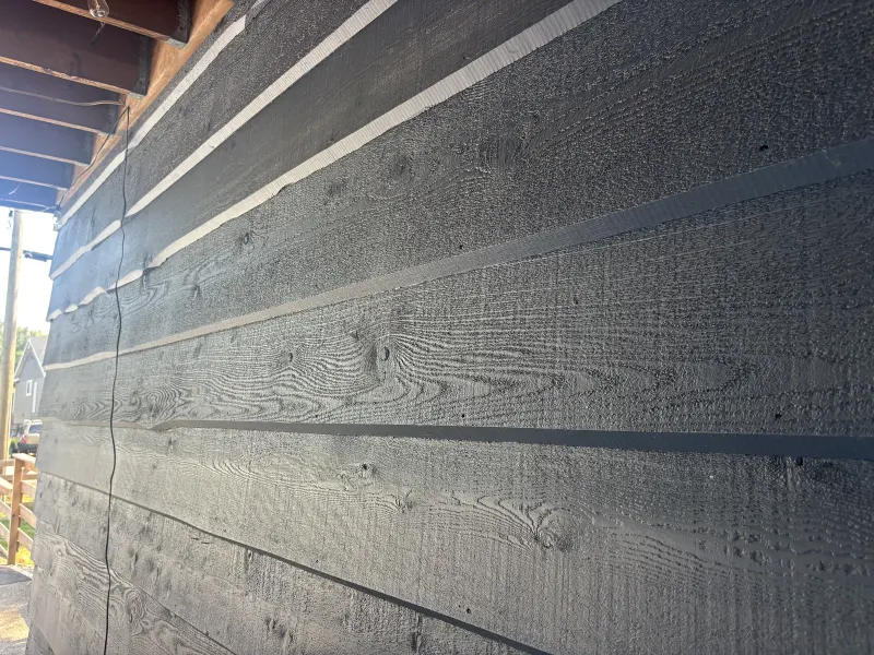 After: Kristen residence side view, fresh siding, Brackendale