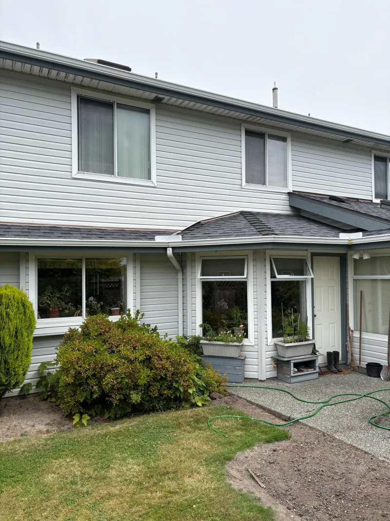 After: Rear elevation with sunroom, patio door, windows and roofline, Ladner, Delta, BC