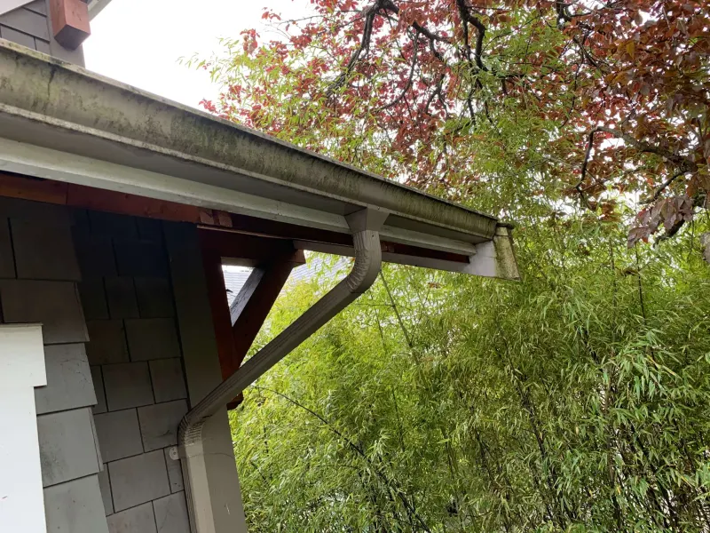 Before stain restoration, exterior view two at this North Vancouver home