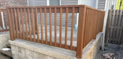 Before deck railing, weathered grey wood, Philadelphia PA