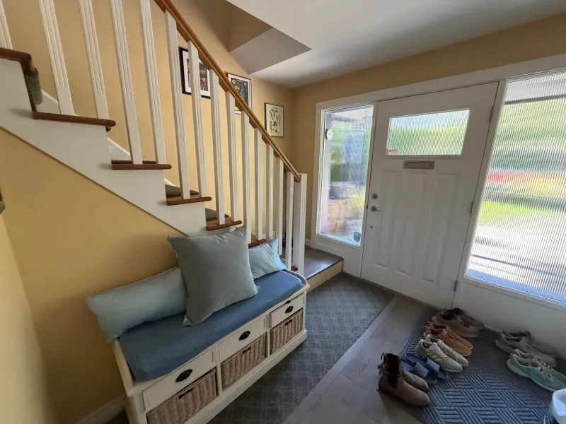 Before: Entryway with staircase, bench, and front door with sidelights, Seafair, Richmond, BC