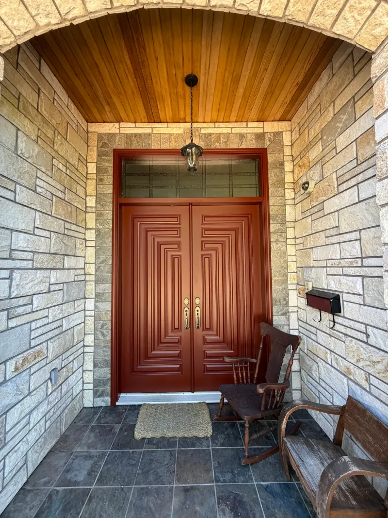 After: Front entry double door with transom window, stone archway and porch ceiling, Seafair, Richmond, BC