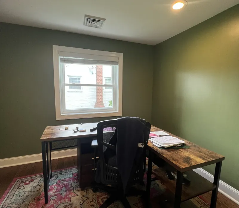 After: Home office with green walls, white trim, desk, and window after painting, Springfield, PA