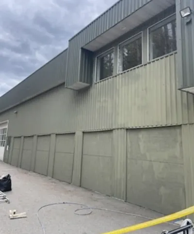 Before commercial painting, faded warehouse exterior, Squamish BC