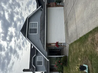 After: completed exterior, Steveston Richmond BC, Network Grey siding