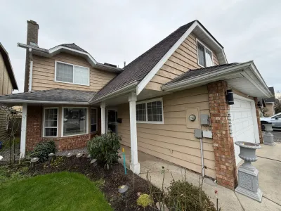 Before: Steveston Richmond BC, beige wood siding before painting