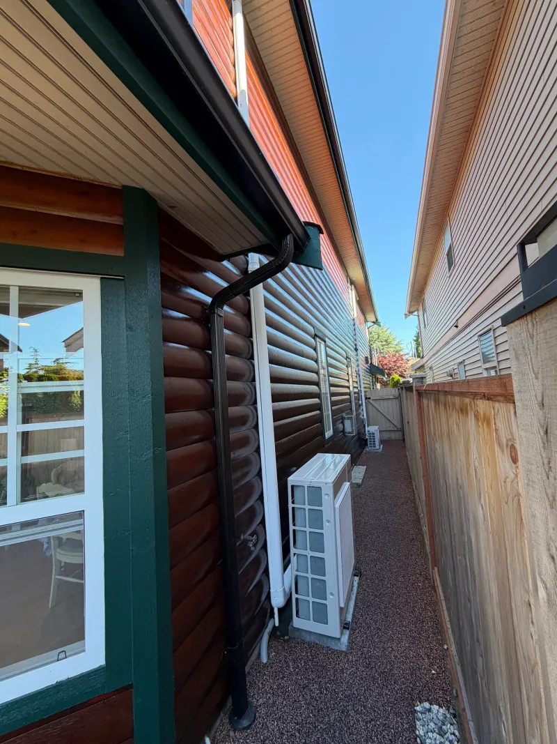 After: Side yard walkway along log siding wall with a window, Steveston, Richmond, BC