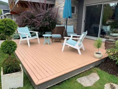 After: Cedar deck boards with amber Sico ProLuxe stain, Squamish BC