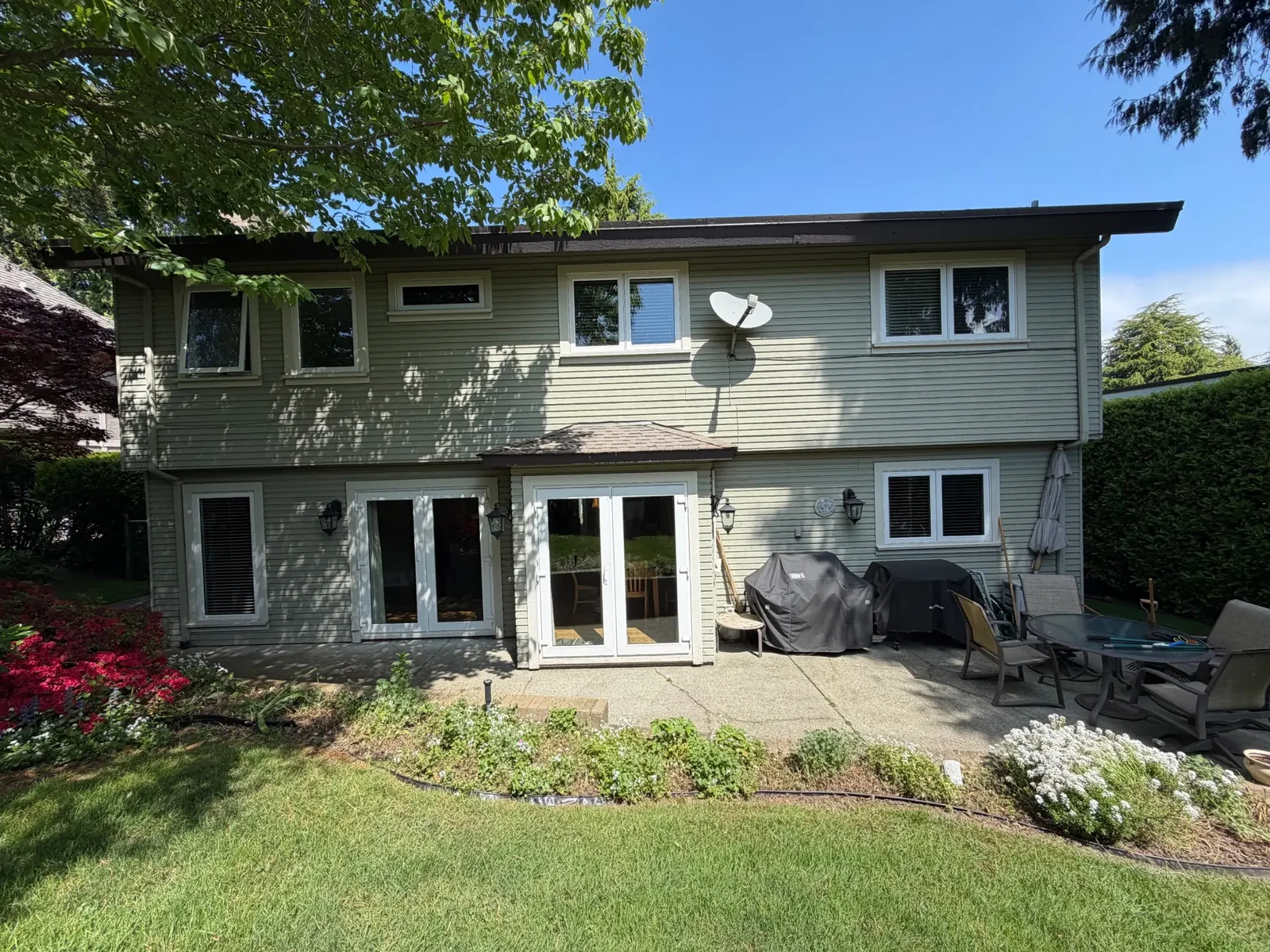 Before: Tsawwassen Delta BC, original sage green siding