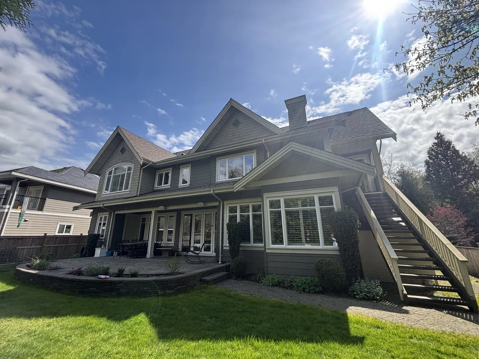 Before — Adam residence exterior painting, Brackendale Squamish BC — original siding condition