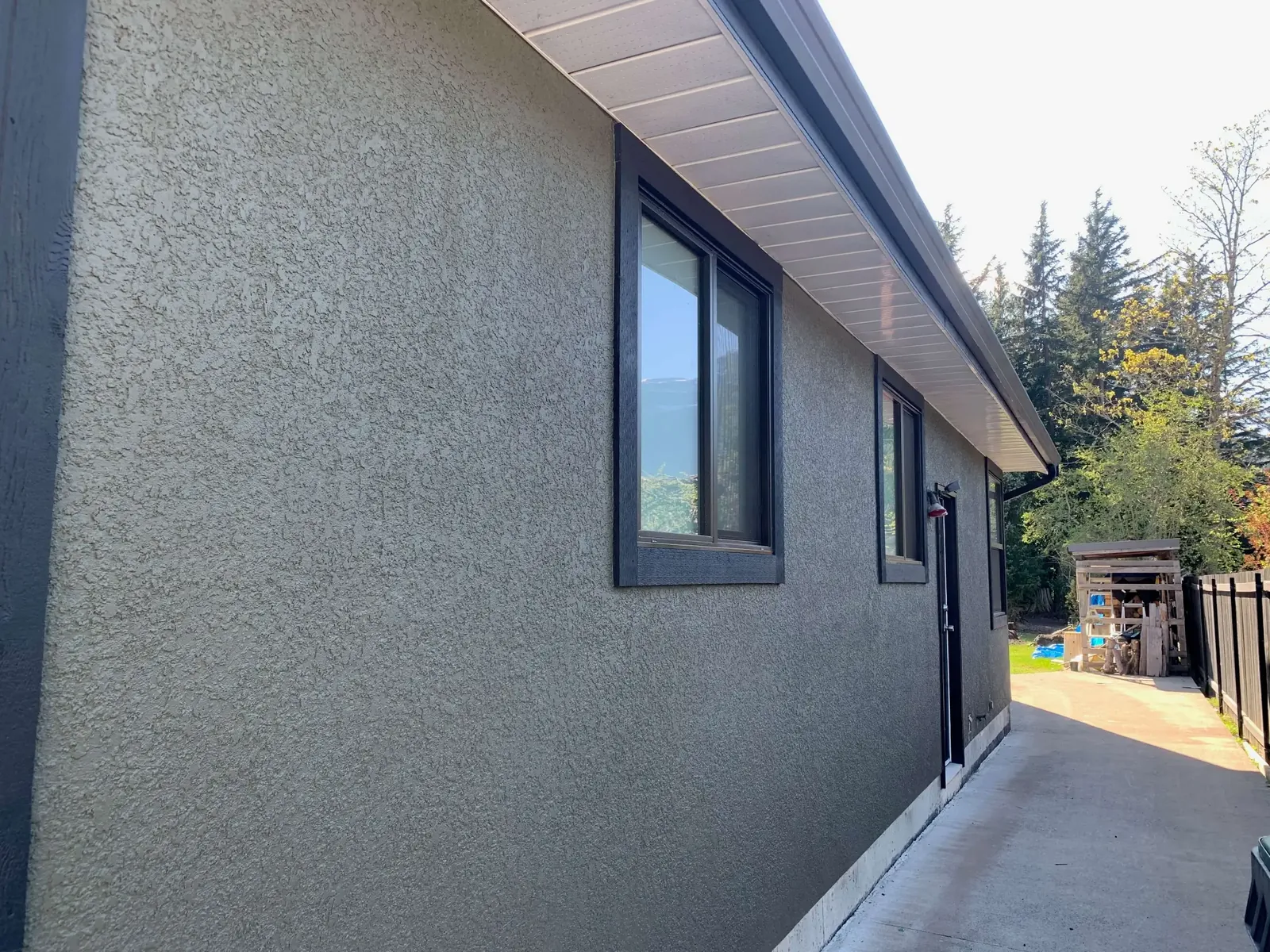 After — Amy residence stucco detail, grey