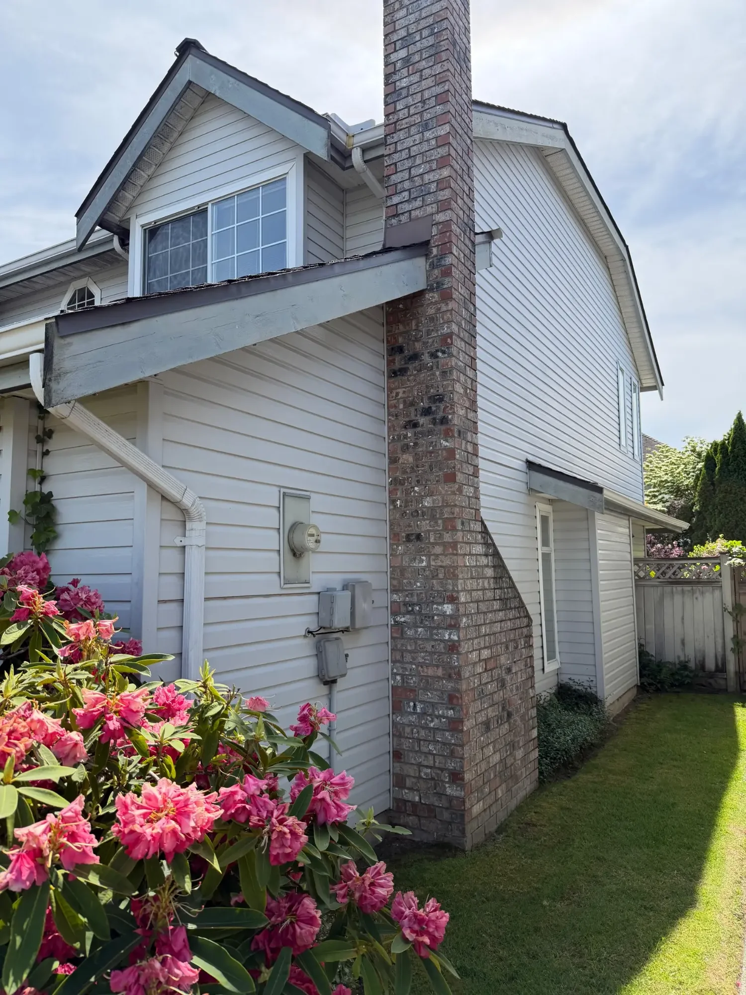 Before side elevation and exterior trim at Dick’s Ladner home in Delta, BC