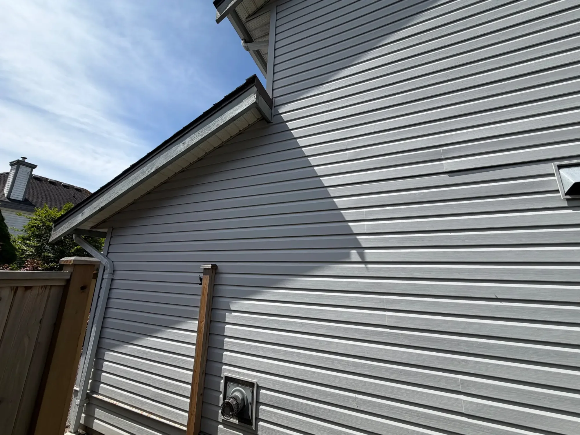 Before gable trim and adjacent vinyl siding at Dick’s Ladner home in Delta, BC