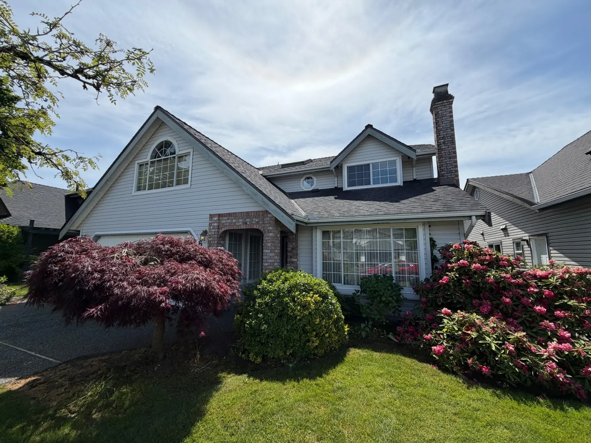 Before front exterior trim view at Dick’s Ladner home in Delta, BC