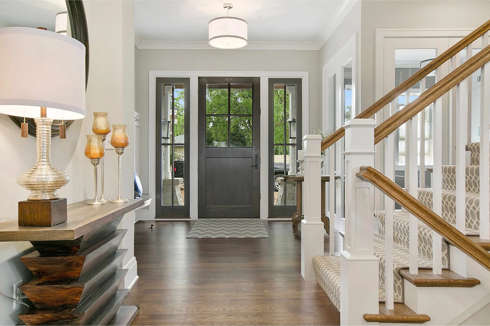 Foyer with teal door, tile floor and console table — how to choose foyer paint colour West Vancouver BC by Colour Craft Painting