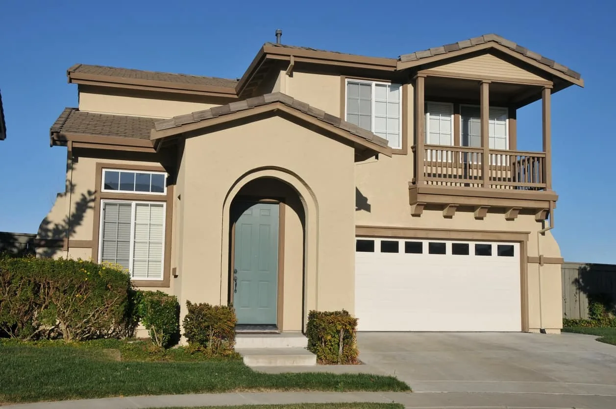 Professional exterior painters at work on North Vancouver BC home — Colour Craft Painting
