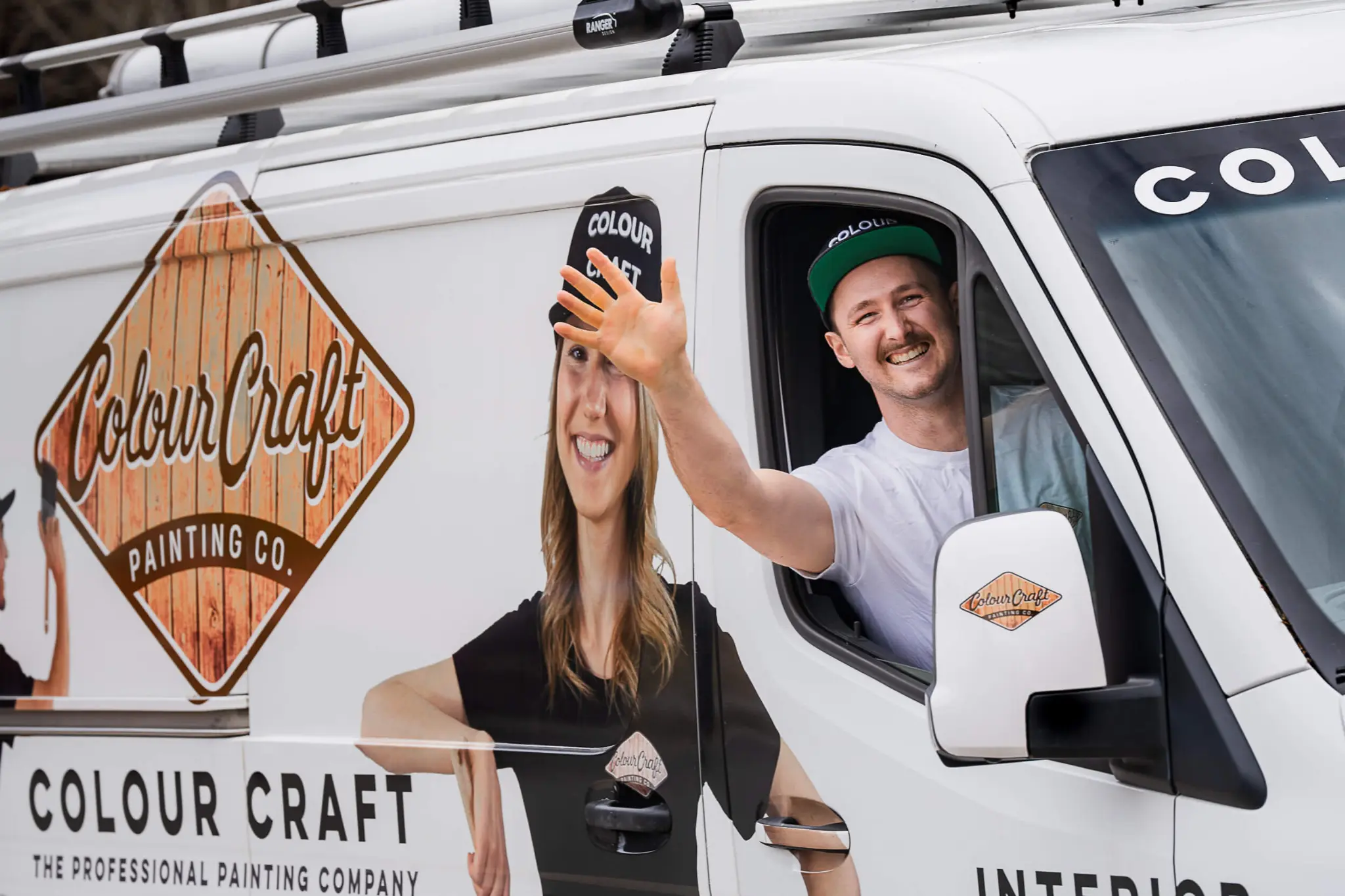 Colour Craft Painting branded van with team