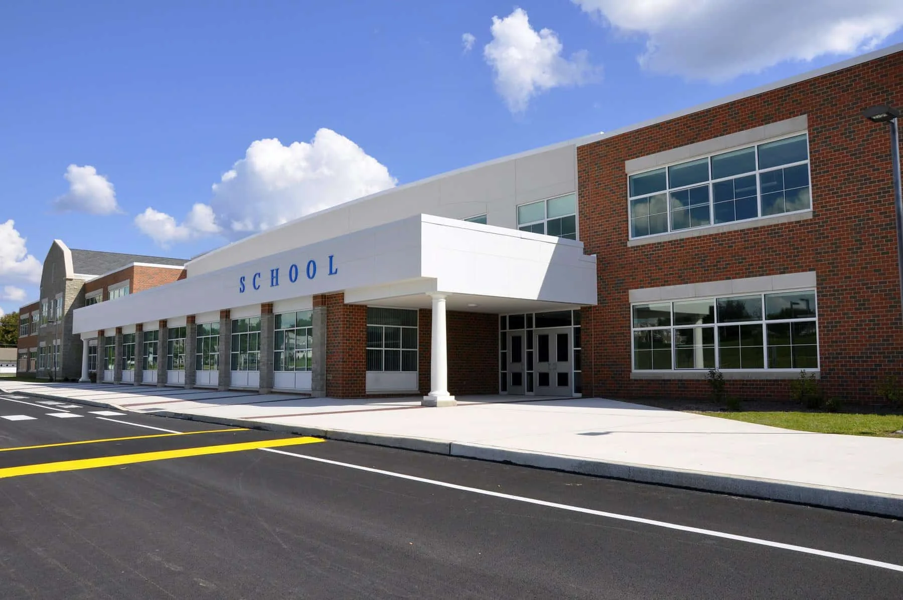 Commercial building exterior repaint — Colour Craft Painting