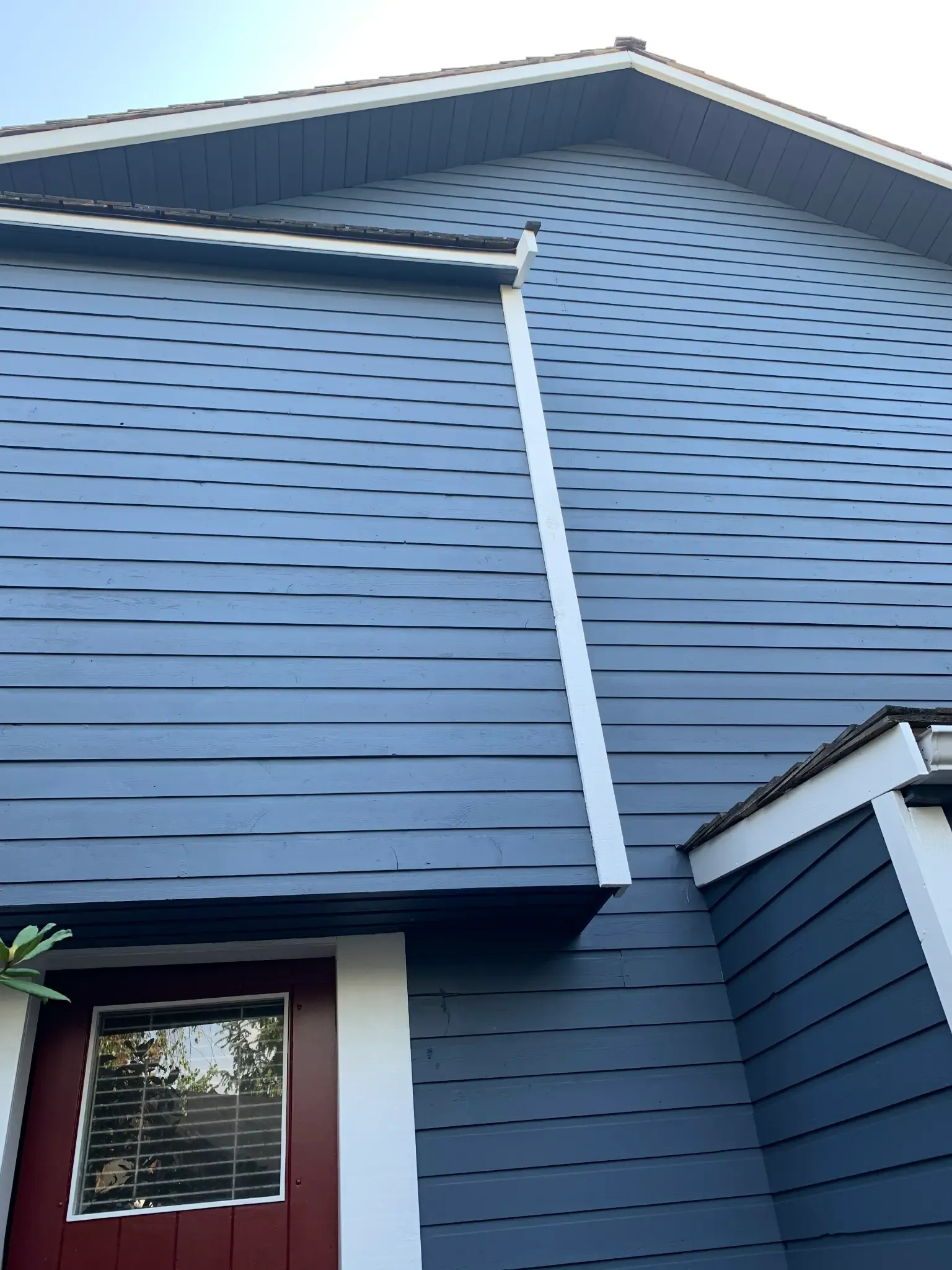 After — Side gable with navy siding and white trim, Brackendale Squamish BC