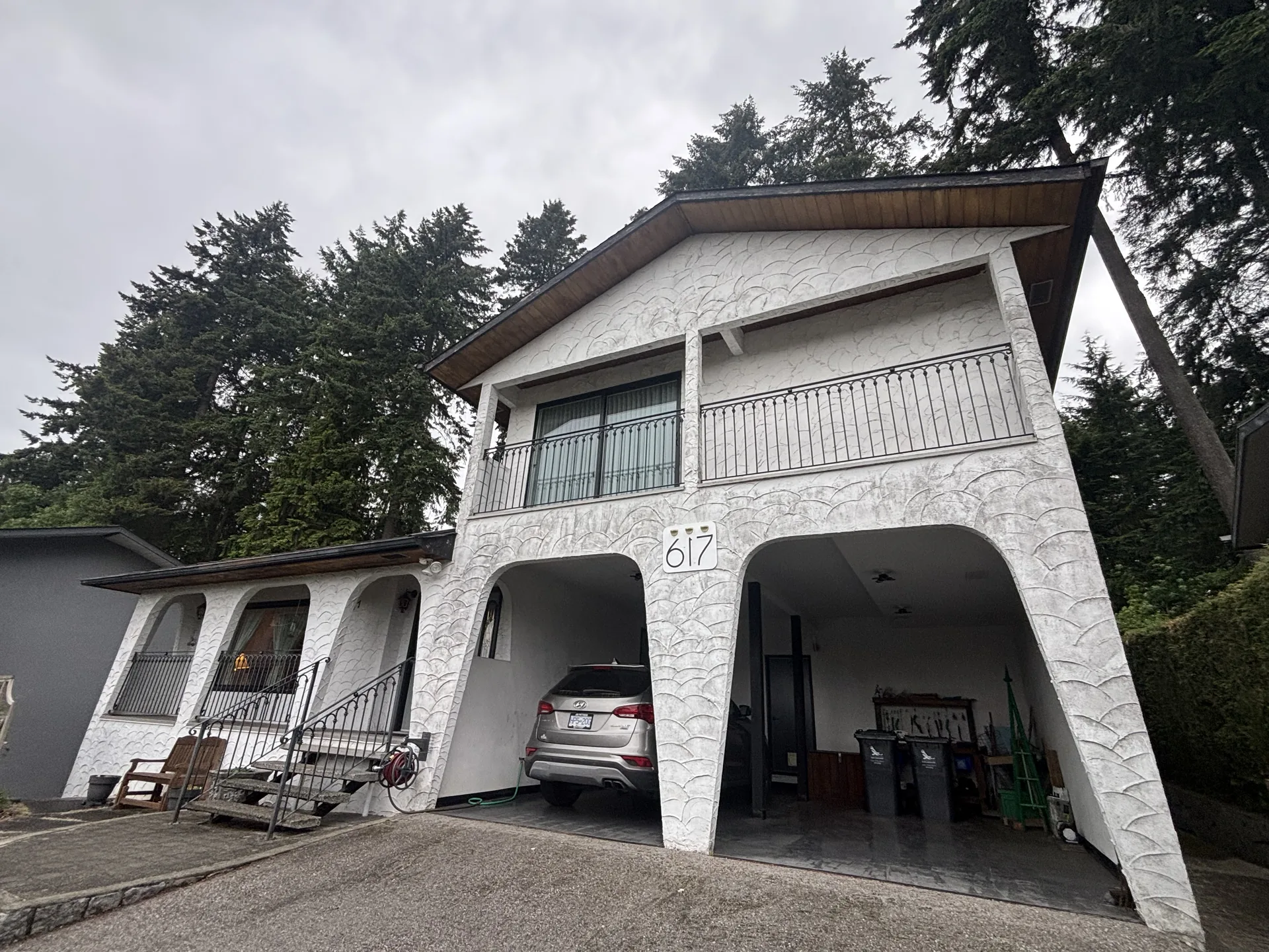 Before — Stucco Repaint & Soffit Restoration — Edgemont Village, North Vancouver, BC