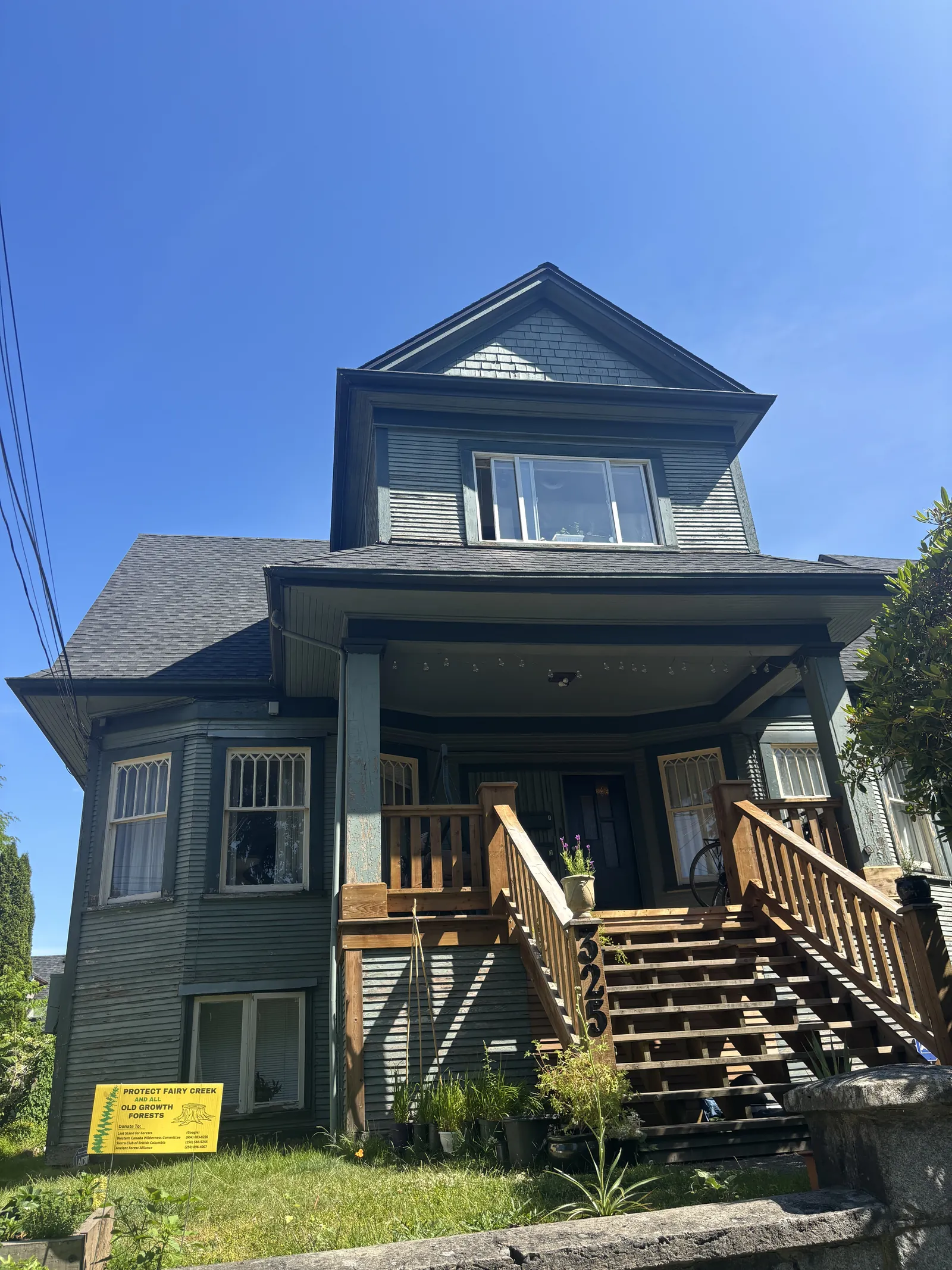 Before — East Vancouver heritage home exterior, original siding condition