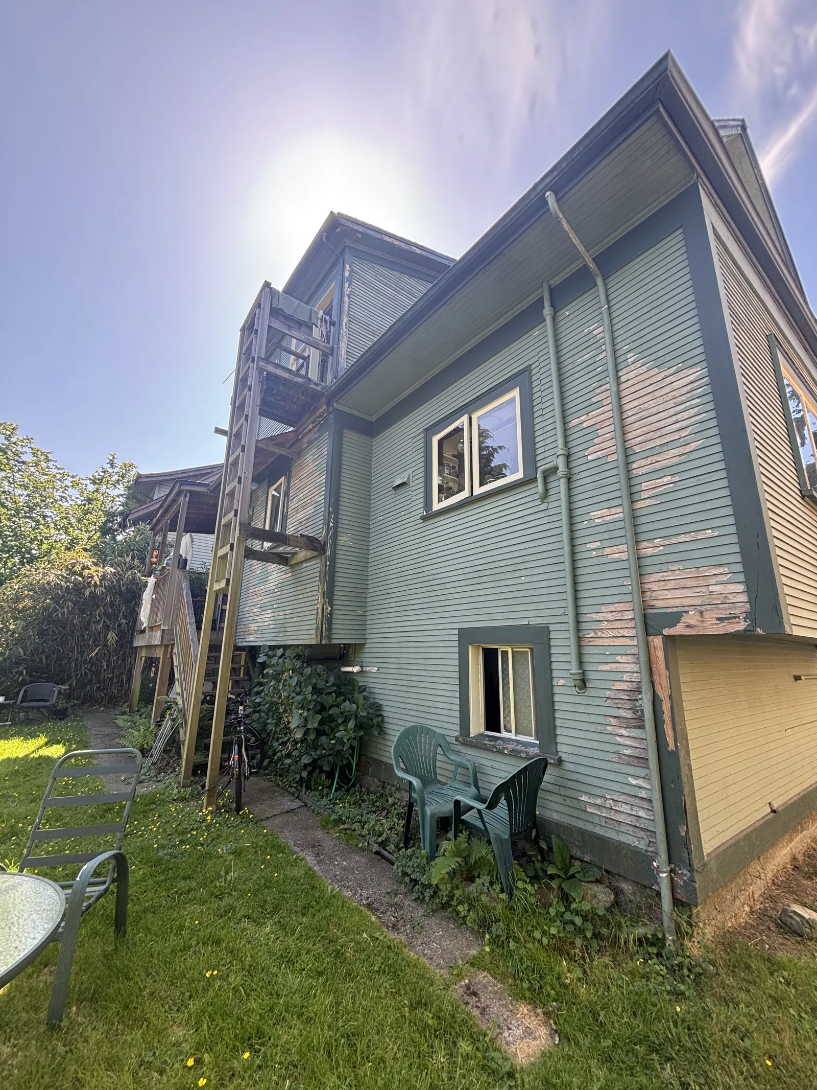 Before — East Vancouver heritage home siding detail