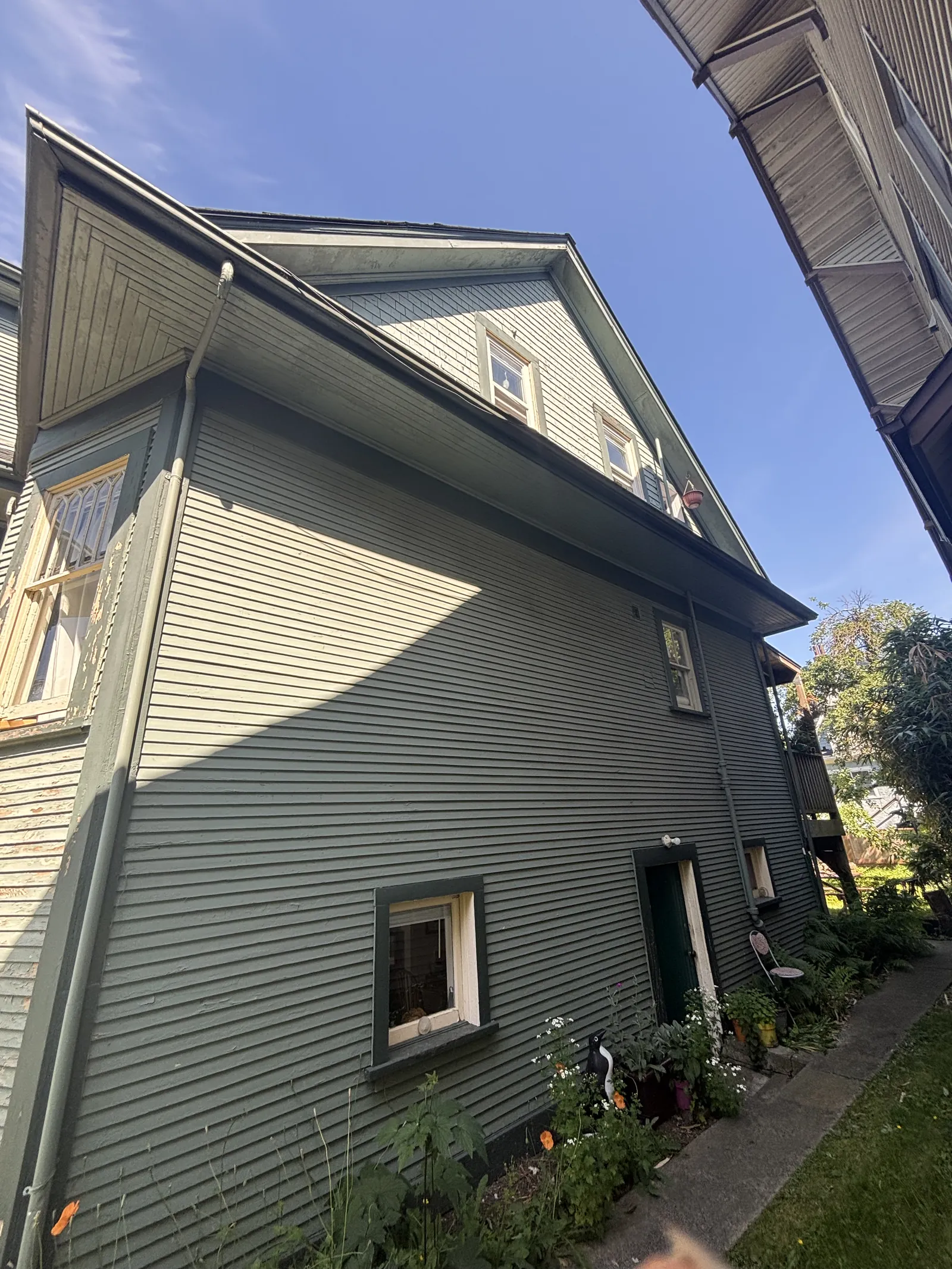 Before — East Vancouver heritage home back view